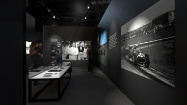 Visitors Enjoying the F1 Exhibition Looking at a Gallery